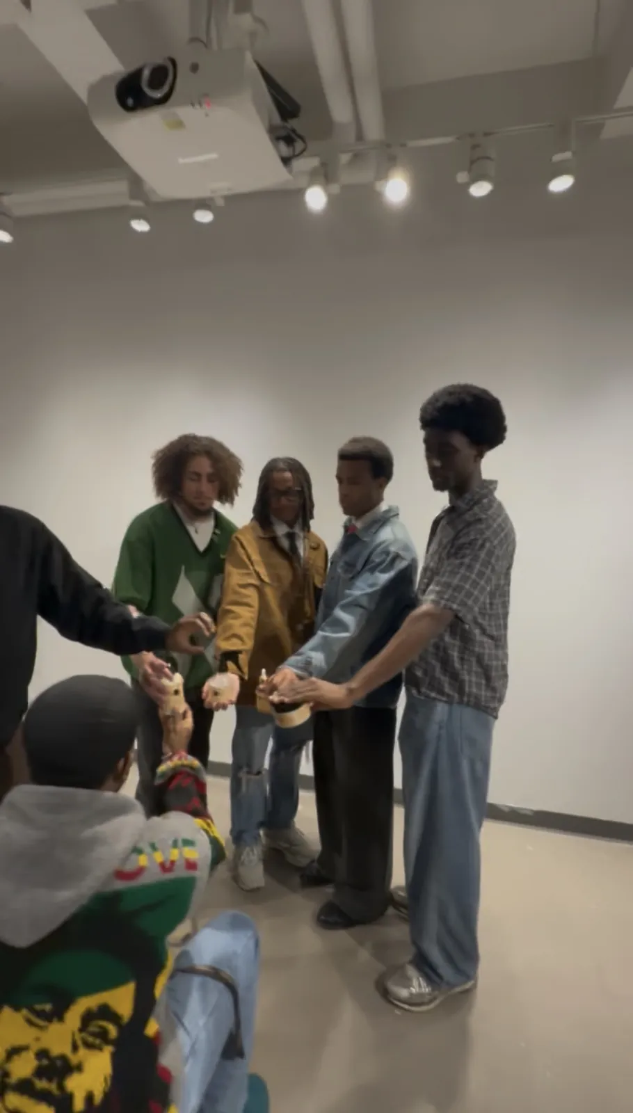 Handing products out to the models.