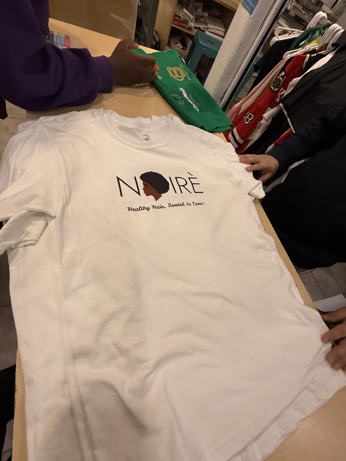 A Noirè t-shirt, fresh off the press.